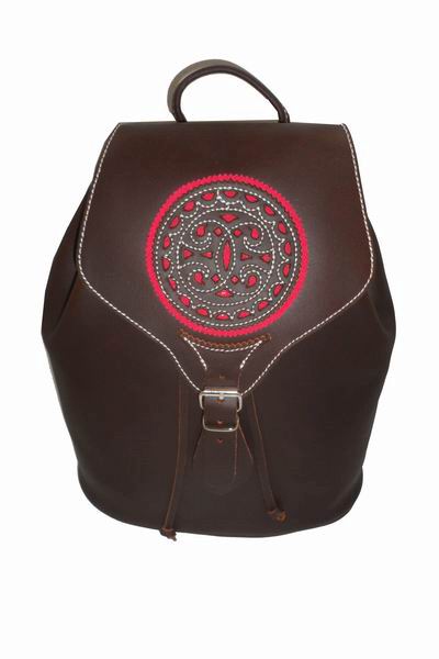 Rociero Leather Backpack with Openwork Flap with Fuchsia Background